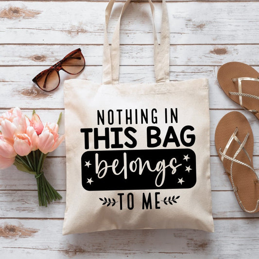 Cotton canvas tote bag with bold black printed minimalist text graphic design